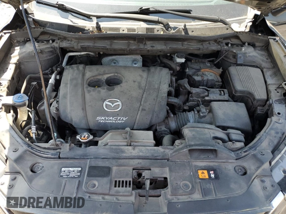 2015 Mazda CX-5 Touring with VIN JM3KE4CY6F0434538, listed as a Copart auction lot 54966145 with 209,447 mi miles and Clean Title. Bid and sale history available at DreamBid. Image 12.