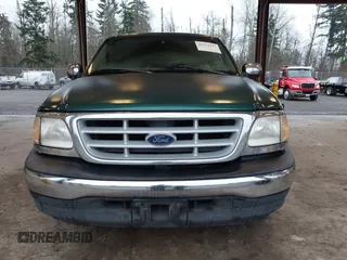 1999 Ford F-150 with VIN 2FTRX17L9XCA19030, listed as a IAAI auction lot 41232157 with Not provided miles and . Bid and sale history available at DreamBid. Image 13.