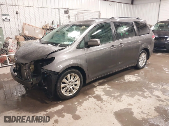2011 Toyota Sienna LE with VIN 5TDJK3DC2BS013045, listed as a IAAI auction lot 41127037 with 239,401 mi miles. Bid and sale history available at carsss.com. Image 18.