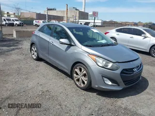 2014 Hyundai Elantra GT with VIN KMHD35LH8EU216052, listed as a IAAI auction lot 42102173 with 112,129 mi miles. Bid and sale history available at carsss.com. Image 1.