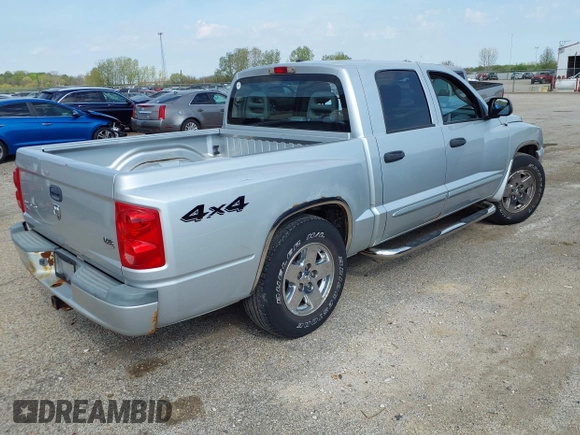 2006 Dodge Dakota SLT z VIN 1D7HW48N76S645515, wystawiony jako IAAI lot #42091904 z przebiegiem 160 695 mil mil oraz . Historia ofert i sprzedaży dostępna na DreamBid. Obrazek 4.