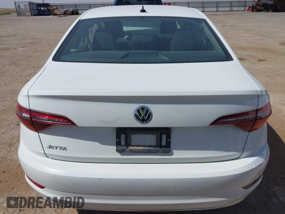 2019 Volkswagen Jetta S z VIN 3VWC57BU7KM110001, wystawiony jako IAAI lot #42244184 z przebiegiem 49 883 mil mil oraz . Historia ofert i sprzedaży dostępna na DreamBid. Obrazek 17.
