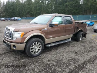 2012 Ford F-150 XL with VIN 1FTFW1ETXCKD55803, listed as a Copart auction lot 49683115 with 99,112 mi miles and Salvage Title. Bid and sale history available at carsss.com. Image 1.