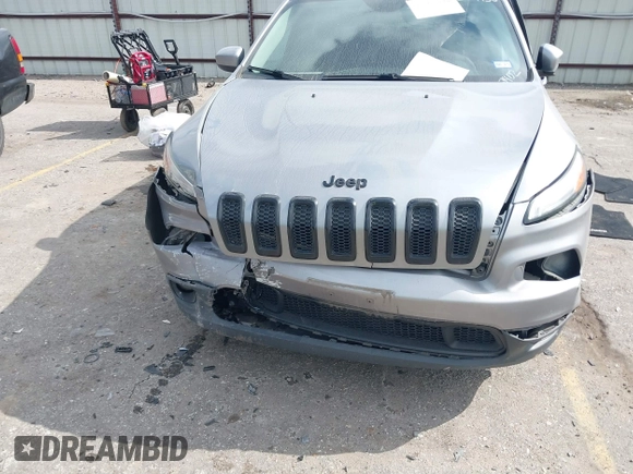 2016 Jeep Cherokee Latitude with VIN 1C4PJLCB3GW107402, listed as a IAAI auction lot 41505242 with 110,994 mi miles. Bid and sale history available at carsss.com. Image 6.