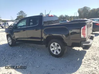 2015 GMC Canyon 2WD SLE with VIN 1GTG5BEA6F1221120, listed as a Copart auction lot 77391484 with 180,334 mi miles and Salvage Title. Bid and sale history available at carsss.com. Image 2.