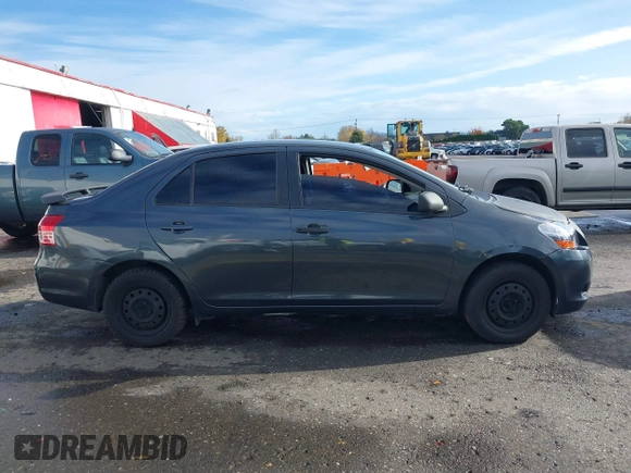 2010 Toyota Yaris with VIN JTDBT4K37A4068398, listed as a IAAI auction lot 40915313 with 123,222 mi miles. Bid and sale history available at carsss.com. Image 12.