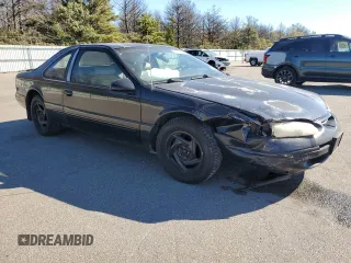 1997 Ford Thunderbird LX z VIN 1FALP62W9VH112212, wystawiony jako Copart lot #75232034 z przebiegiem 138 666 mil mil oraz Szkoda całkowita • Salvage title. Historia ofert i sprzedaży dostępna na DreamBid. Obrazek 4.