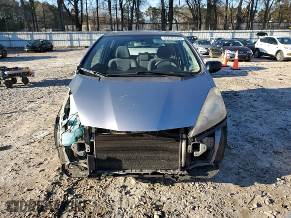 2009 Honda Fit with VIN JHMGE88219S050197, listed as a Copart auction lot 45876345 with 208,046 mi miles and Salvage Title. Bid and sale history available at DreamBid. Image 5.