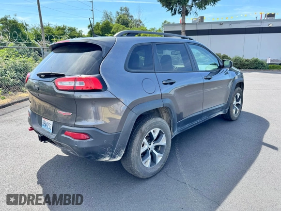 2018 Jeep Cherokee Trailhawk z VIN 1C4PJMBX0JD600413, wystawiony jako Copart lot #60336385 z przebiegiem 64 875 mil mil oraz Czysty tytuł • Clean title. Historia ofert i sprzedaży dostępna na DreamBid. Obrazek 4.