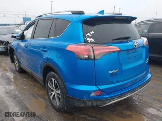 2017 Toyota RAV4 XLE with VIN 2T3RFREV2HW693031, listed as a IAAI auction lot 41671812 with 82,190 mi miles. Bid and sale history available at carsss.com. Image 3.