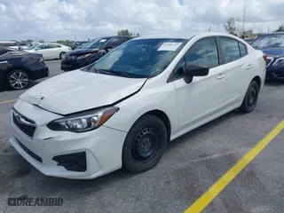 2018 Subaru Impreza with VIN 4S3GKAA68J3609404, listed as a IAAI auction lot 41954733 with 214,560 mi miles. Bid and sale history available at carsss.com. Image 2.