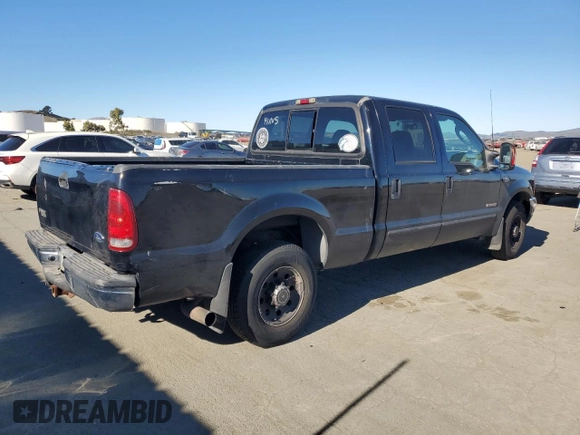 2003 Ford Super Duty F-250 XL with VIN 1FTNW20P23EB90968, listed as a Copart auction lot 41882395 with 215,373 mi miles and Salvage Title. Bid and sale history available at carsss.com. Image 3.