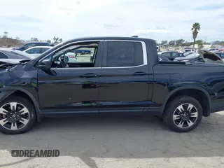 2020 Honda Ridgeline RTL with VIN 5FPYK3F53LB030107, listed as a IAAI auction lot 41933517 with 93,373 mi miles and . Bid and sale history available at DreamBid. Image 14.