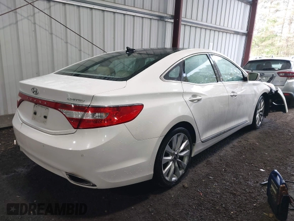 2014 Hyundai Azera Limited with VIN KMHFH4JG7EA378755, listed as a IAAI auction lot 42027136 with 216,082 mi miles and . Bid and sale history available at carsss.com. Image 4.