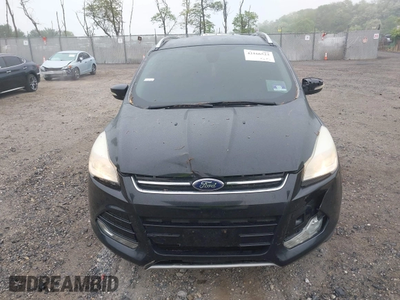 2014 Ford Escape Titanium with VIN 1FMCU9J90EUC24898, listed as a IAAI auction lot 42166523 with 152,464 mi miles and . Bid and sale history available at DreamBid. Image 12.