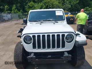 2021 Jeep Wrangler Unlimited Sahara with VIN 1C4HJXEN1MW618508, listed as a IAAI auction lot 42639515 with 39,747 mi miles and . Bid and sale history available at DreamBid. Image 12.