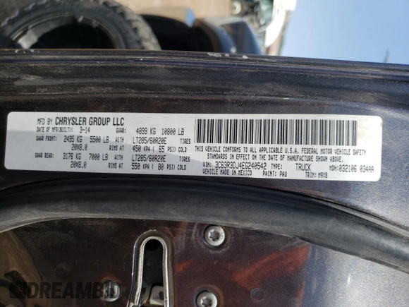 2014 Ram 3500 Big Horn with VIN 3C63R3DJ4EG240542, listed as a Copart auction lot 65465704 with 129,315 mi miles and Salvage Title. Bid and sale history available at carsss.com. Image 12.