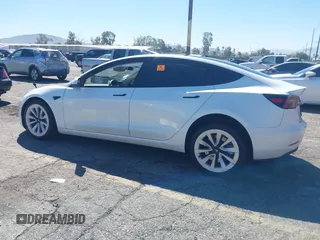 2022 Tesla Model 3 Long Range with VIN 5YJ3E1EB7NF298456, listed as a IAAI auction lot 41859304 with Not Provided miles and . Bid and sale history available at DreamBid. Image 14.