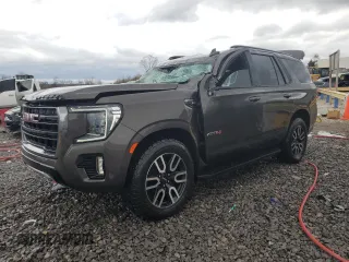 2021 GMC Yukon AT4 with VIN 1GKS2CKD8MR299277, listed as a Copart auction lot 47027565 with 54,806 mi miles and Salvage Title. Bid and sale history available at carsss.com. Image 1.