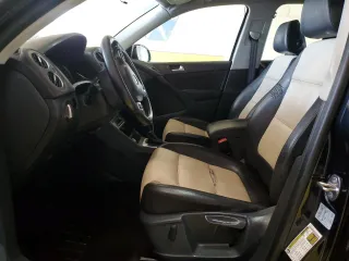 2016 Volkswagen Tiguan S with VIN WVGAV7AX8GW584211, listed as a Copart auction lot 57489065 with 140,420 mi miles and Clean title. Bid and sale history available at DreamBid. Image 7.