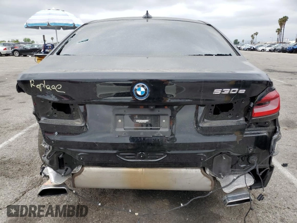 2023 BMW 5 Series 530e with VIN WBA13AG01PCM24624, listed as a Copart auction lot 55149855 with 26,022 mi miles and Salvage title. Bid and sale history available at DreamBid. Image 6.