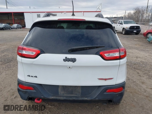 2017 Jeep Cherokee Trailhawk z VIN 1C4PJMBS4HW647835, wystawiony jako IAAI lot #41375077 z przebiegiem 87 208 mil mil oraz . Historia ofert i sprzedaży dostępna na DreamBid. Obrazek 16.