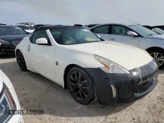 2014 Nissan 370Z Touring with VIN JN1AZ4FH8EM621259, listed as a Copart auction lot 77571454 with Not Provided miles and Salvage Title. Bid and sale history available at DreamBid. Image 4.