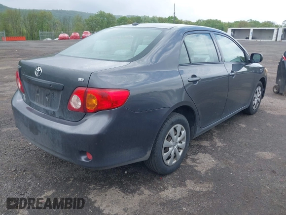 2009 Toyota Corolla with VIN JTDBL40E999048446, listed as a IAAI auction lot 42210822 with 260,005 mi miles. Bid and sale history available at carsss.com. Image 4.