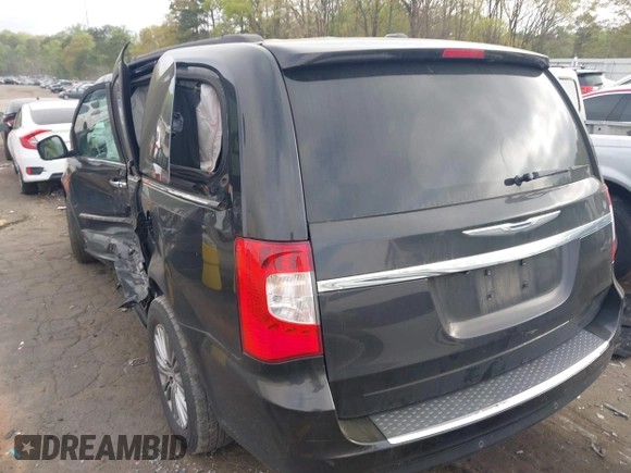 2014 Chrysler Town & Country Touring-L with VIN 2C4RC1CG5ER347141, listed as a IAAI auction lot 41948572 with 133,495 mi miles. Bid and sale history available at carsss.com. Image 3.