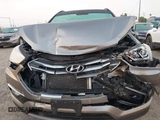 2018 Hyundai Santa Fe Ultimate with VIN 5NMZWDLAXJH100108, listed as a IAAI auction lot 42126768 with 68,325 mi miles and . Bid and sale history available at DreamBid. Image 12.