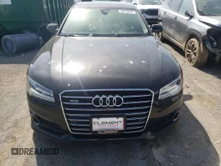 2017 Audi A8 Sport z VIN WAU43AFD8HN008951, wystawiony jako Copart lot #61066193 z przebiegiem Nie podano mil oraz Nie do naprawy • Non repairable. Historia ofert i sprzedaży dostępna na DreamBid. Obrazek 5.