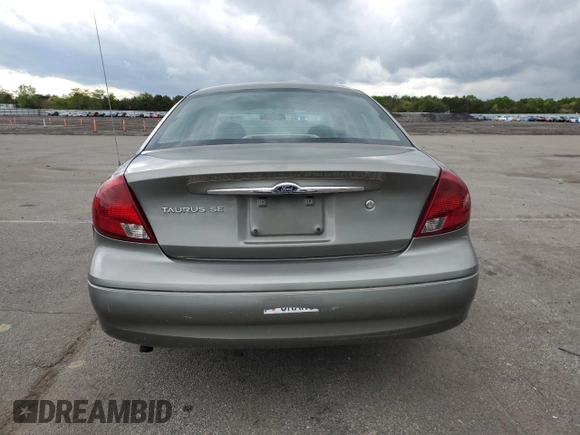 2002 Ford Taurus SE Standard z VIN 1FAFP53U92A246842, wystawiony jako Copart lot #57858765 z przebiegiem 64 545 mil mil oraz Czysty tytuł • Clean title. Historia ofert i sprzedaży dostępna na DreamBid. Obrazek 6.