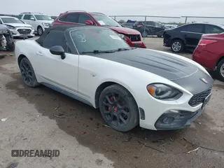 2018 FIAT 124 Spider Classica z VIN JC1NFAEK7J0138623, wystawiony jako IAAI lot #41919114 z przebiegiem 26 327 mil mil oraz . Historia ofert i sprzedaży dostępna na DreamBid. Obrazek 1.