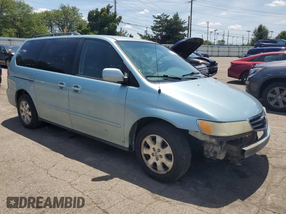 2004 Honda Odyssey EX-L with VIN 5FNRL18014B015462, listed as a Copart auction lot 62834665 with 323,817 mi miles and Salvage title. Bid and sale history available at DreamBid. Image 4.