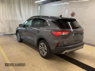 2021 Ford Escape SEL Hybrid z VIN 1FMCU9CZ7MUA83422, wystawiony jako IAAI lot #42743365 z przebiegiem 70 851 mil mil oraz . Historia ofert i sprzedaży dostępna na DreamBid. Obrazek 2.
