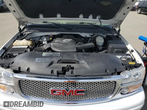 2005 GMC Sierra Denali z VIN 2GTEK63N951344416, wystawiony jako Copart lot #45877865 z przebiegiem 150 707 mil mil oraz Nie do naprawy. Historia ofert i sprzedaży dostępna na DreamBid. Obrazek 11.