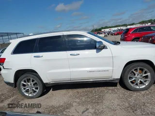 2014 Jeep Grand Cherokee Summit with VIN 1C4RJFJT3EC523129, listed as a IAAI auction lot 42341296 with 171,468 mi miles and . Bid and sale history available at DreamBid. Image 13.