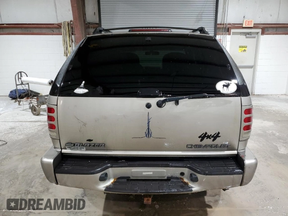 2000 Chevrolet Blazer LS z VIN 1GNCT18W9YK188091, wystawiony jako Copart lot #78592844 z przebiegiem 69 497 mil mil oraz Szkoda całkowita • Salvage title. Historia ofert i sprzedaży dostępna na DreamBid. Obrazek 6.