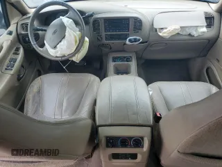 2002 Ford Expedition Eddie Bauer with VIN 1FMPU18LX2LA39571, listed as a Copart auction lot 58774915 with 388,886 mi miles and Salvage title. Bid and sale history available at DreamBid. Image 8.