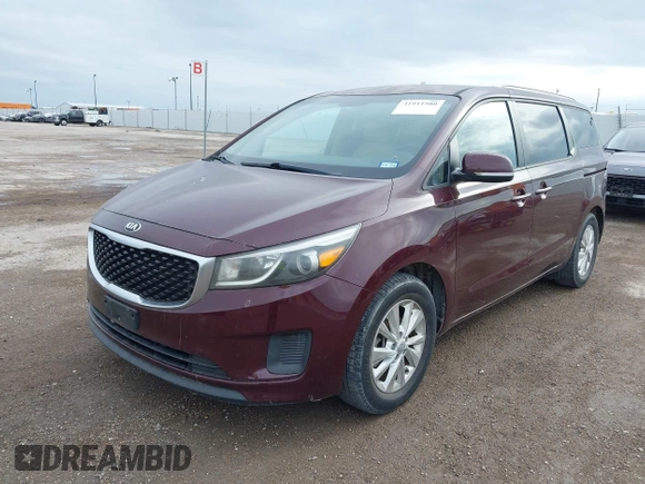 2016 Kia Sedona LX with VIN KNDMB5C10G6090643, listed as a IAAI auction lot 41911980 with 155,319 mi miles. Bid and sale history available at carsss.com. Image 2.