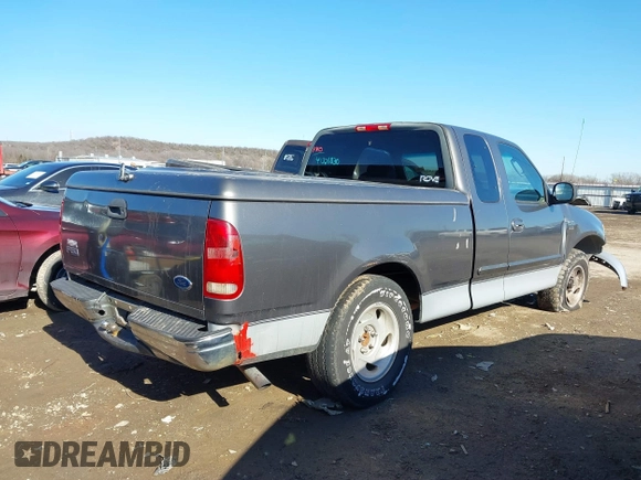 2003 Ford F-150 XL with VIN 2FTRX17W63CA93767, listed as a IAAI auction lot 41321830 with Not provided miles and . Bid and sale history available at DreamBid. Image 4.