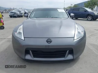 2012 Nissan 370Z Touring with VIN JN1AZ4EH4CM561415, listed as a IAAI auction lot 41838948 with 111,298 mi miles. Bid and sale history available at carsss.com. Image 12.