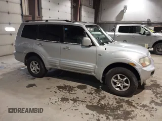 2002 Mitsubishi Montero Limited z VIN JA4MW51R02J016667, wystawiony jako IAAI lot #41267504 z przebiegiem 167 446 mil mil oraz . Historia ofert i sprzedaży dostępna na DreamBid. Obrazek 1.