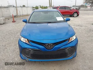2020 Toyota Camry LE with VIN 4T1L11AK5LU310671, listed as a IAAI auction lot 41732306 with 61,379 mi miles and . Bid and sale history available at carsss.com. Image 13.
