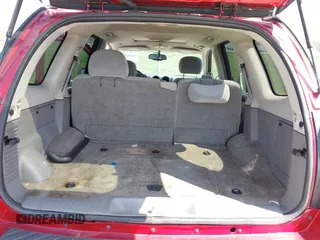2005 GMC Envoy SLT with VIN 1GKDS13SX52144959, listed as a IAAI auction lot 41968495 with 238,199 mi miles. Bid and sale history available at carsss.com. Image 17.
