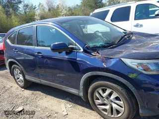 2015 Honda CR-V EX with VIN 3CZRM3H54FG708165, listed as a IAAI auction lot 41780434 with 101,552 mi miles. Bid and sale history available at carsss.com. Image 13.