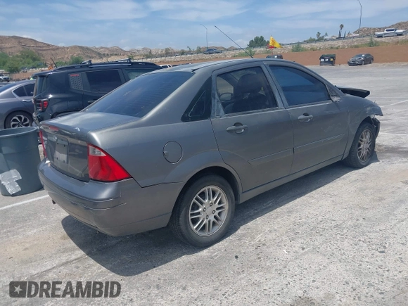 2007 Ford Focus S z VIN 1FAFP34N17W123378, wystawiony jako IAAI lot #42208033 z przebiegiem 183 803 mil mil oraz . Historia ofert i sprzedaży dostępna na DreamBid. Obrazek 4.