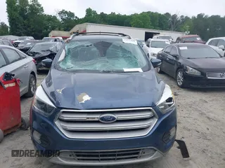 2018 Ford Escape Titanium with VIN 1FMCU0J99JUA12717, listed as a IAAI auction lot 42237509 with 123,896 mi miles and . Bid and sale history available at DreamBid. Image 12.