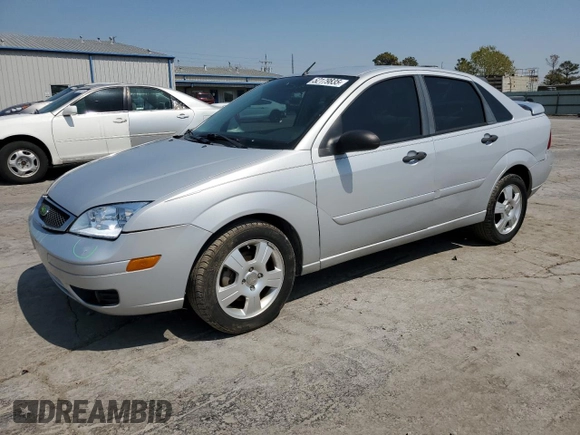 2007 Ford Focus S with VIN 1FAHP34N77W364581, listed as a Copart auction lot 52179835 with 111,701 mi miles and Salvage Title. Bid and sale history available at carsss.com. Image 1.