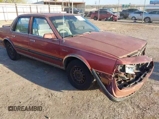 1990 Oldsmobile Cutlass Ciera with VIN 2G3AM54N7L2303078, listed as a IAAI auction lot 41882943 with 190,496 mi miles and . Bid and sale history available at DreamBid. Image 1.